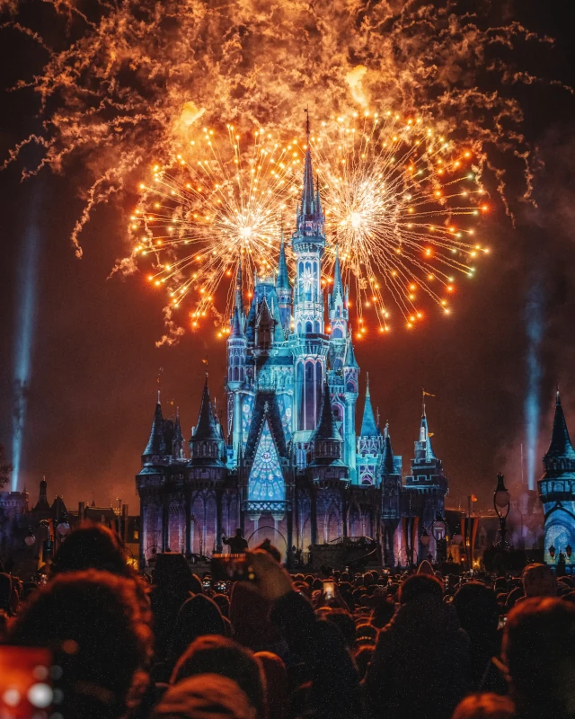 A fairytale castle with fireworks at Disneyland. 