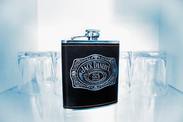 A Jack Daniel's branded hip-flask. 