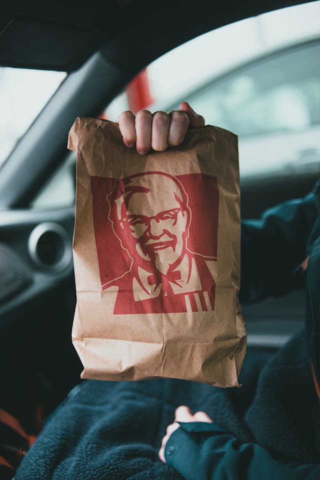 A KFC take-out paper bag. 