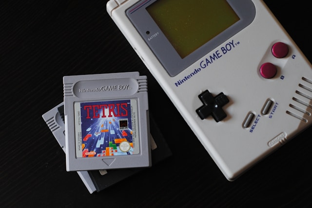 A Nintendo Gameboy and cartridges. 
