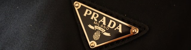 Prada logo on a handbag.