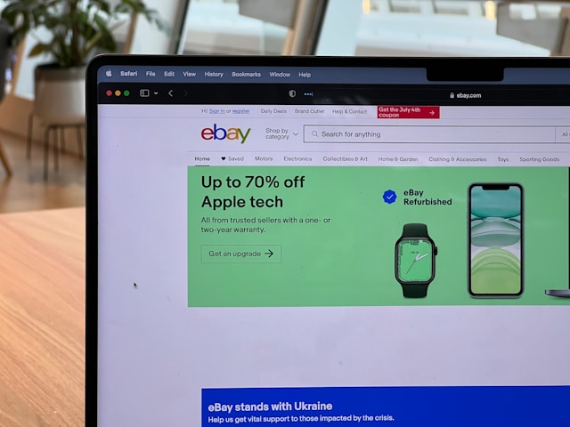 A laptop with eBay shown in a web browser.