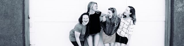 A group of women laughing.