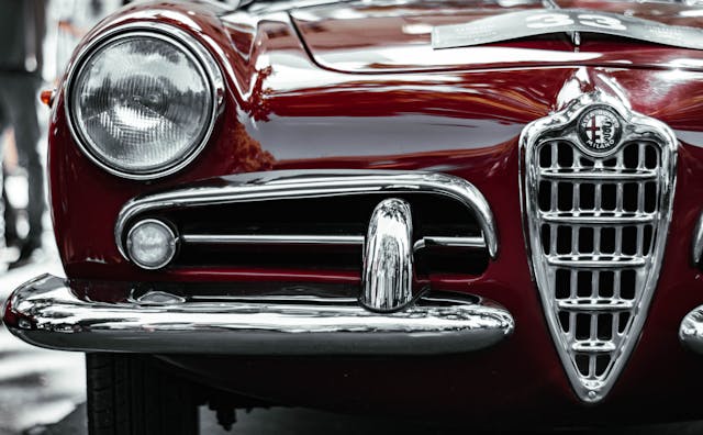 The grille badge of a classic Alfa Romeo car. 