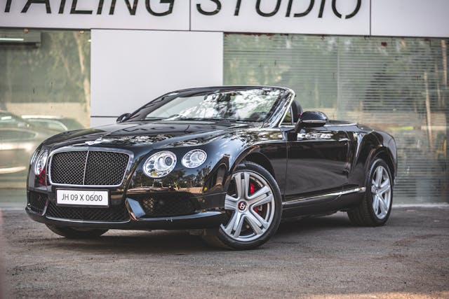 Convertible Bentley with its roof down.