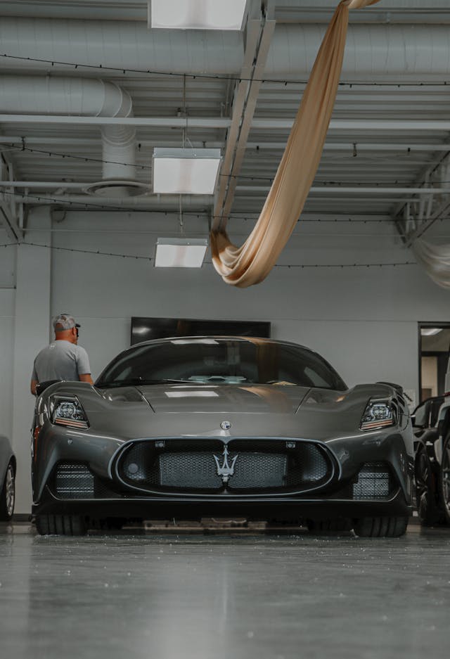 Silver Maserati sports car.